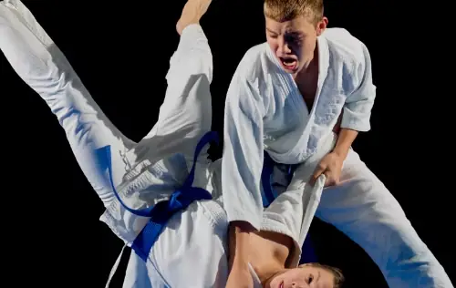 Young Sentry Jiu-Jitsu students performing a controlled Brazilian Jiu-Jitsu technique